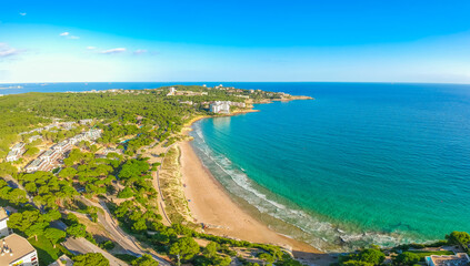 Fototapeta na wymiar Beach view in Salou, Spain, Europe. Tourist sea city on Costa Dorada