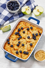 Apple Crumble topped with fresh berries, top view