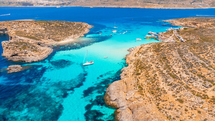 View of Blue Lagoon paradise Malta, Europe. Azure sea, Comino island - obrazy, fototapety, plakaty