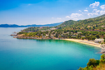 Naklejka na ściany i meble Panorama of Tosca sand beach and blue water near Kavala, Greece, Europe