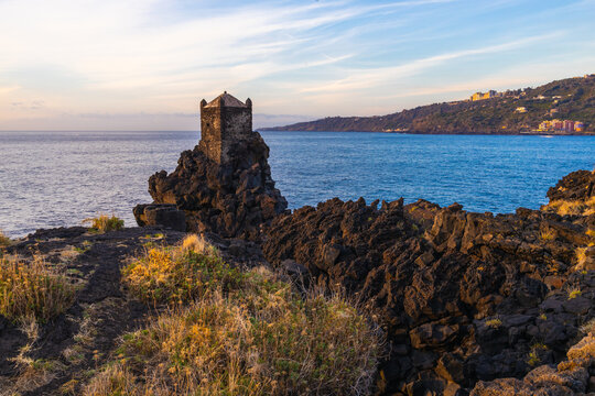 Torre Saracena old tower, Santa Tecla, Catania, Sicily. Sea and rocks