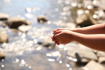Summer cloudy mountain river view, mountain river, rocky shore, fast river in the mountains, Ukraine, wash your hands in the river
