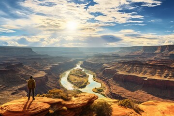 Naklejka premium The traveler looks at a beautiful morning panorama with canyons and rivers. 