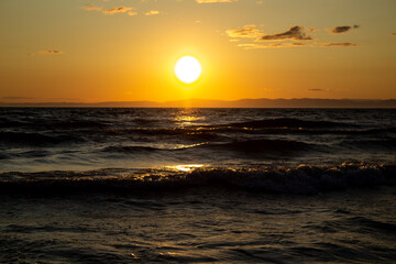 Lake Baikal waves in sunset