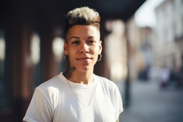 Fototapeta premium Portrait of a queer person, lesbian, non-binary, androgynous, transgender. Pride month concept.