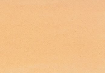 Brown paper texture or cardboard sheet background for design with copy space for text or image.