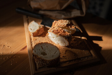 sliced French baguette on a wooden board