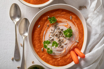 Creamy carrot soup made of cream and fresh vegetables.
