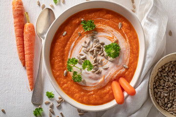 Vegan carrot soup made of cream and fresh vegetables.