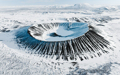 Volcanic crater covered in snow in northern Iceland