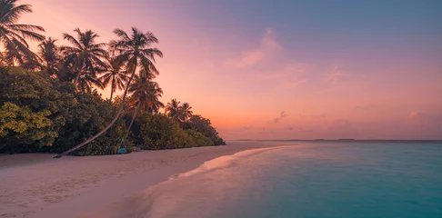 Zelfklevend Fotobehang Beautiful panoramic sunset tropical paradise beach. Tranquil summer vacation or holiday landscape. Tropical sunset beach seaside palm calm sea panorama exotic nature view inspirational seascape scenic © icemanphotos