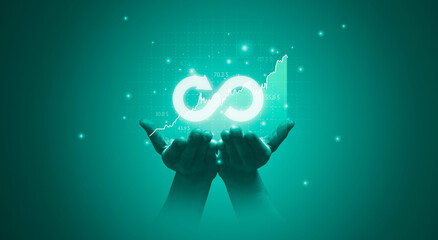 Hand holding infinity sign symbol with stock market investment graph for circular economy and...