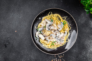 spaghetti mushroom champignon pasta second course vegetable food healthy meal food snack on the table copy space food background rustic top view