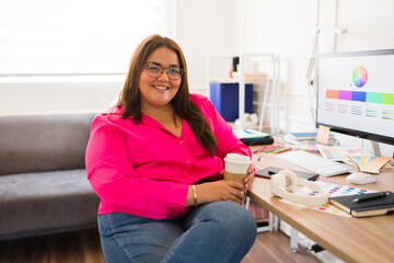 Attractive fat woman working as a graphic designer