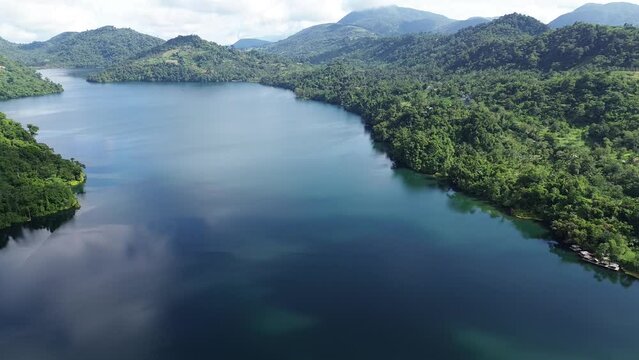 Aerial view of the Danao lake and clouds In the Philippines. Aero shot. High quality FullHD footage	