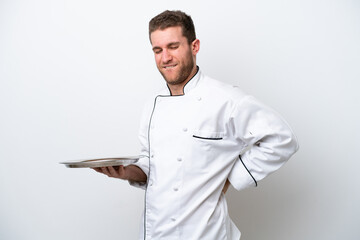 Young caucasian chef with tray isolated on white background suffering from backache for having made an effort