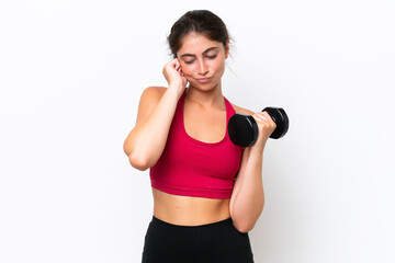 Fototapeta na wymiar Young sport caucasian woman making weightlifting isolated on white background frustrated and covering ears