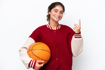 Young basketball player woman isolated on white background showing and lifting a finger in sign of the best