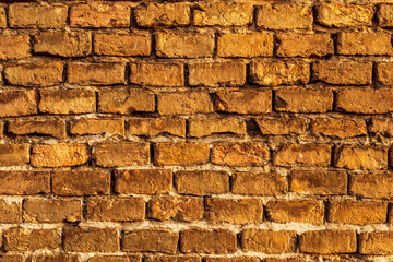 breautiful colorful old brick wall background for wallpaper and design concept, vintage wall with yellow and brown , old texture of vintage building backdrop