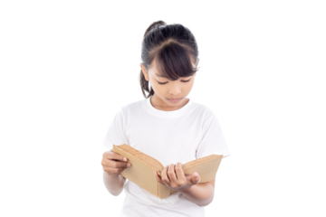 Lovely little girl standing and reading book isolated on white background with clipping path.
