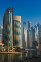 Plakat High rise buildings and streets in Dubai, UAE