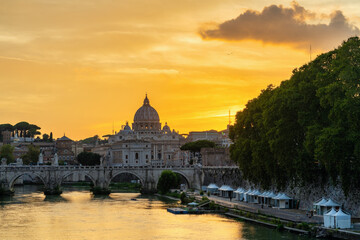 Fototapeta na wymiar St. Peter's basilica at sunset in Rome, Italy