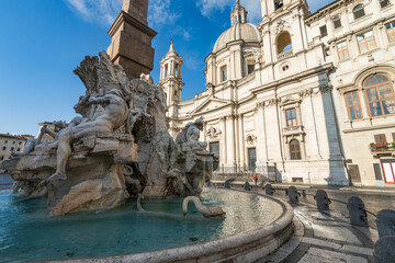 Fototapeta na wymiar Close up view of Fountain dei Quattro at Piazza Navona on sunny summer day