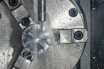 The 5-axis CNC milling machine  cutting the turbocharger part with solid ball end mill tool.