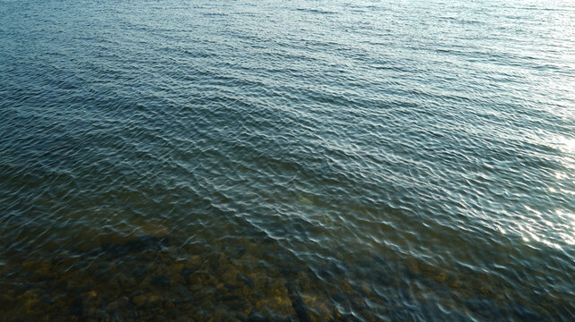Calm river water surface texture background