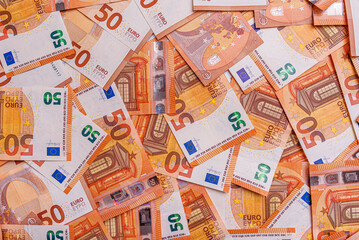 Fototapeta na wymiar 50 euro banknotes as an abstract business background.