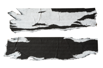 two pieces of peeled black and white paper