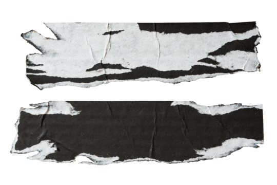 two pieces of peeled black and white paper