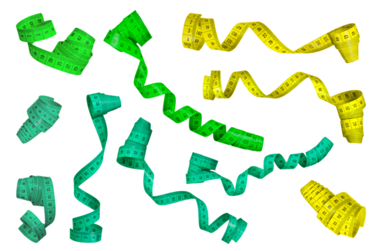 Measuring tape isolated on white background. A large set of measuring tapes of different colors rolled into a spiral. Ribbons of green and yellow in centimeters on a white background.