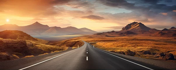 Foto op Canvas A long road leading towards to hight mountains. Journey concept, copy space for text. © amazingfotommm