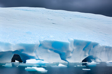 Arctic's high glacial cliffs iceberg in polar regions. Generative AI
