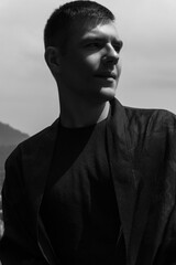 Obraz premium black and white portrait of a guy close-up