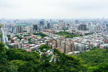 Fototapeta premium Taipei City, Taiwan - July 1 2023: Aerial view of the cityscape from Xianjiyan