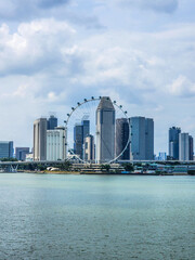 Fototapeta na wymiar a view of the Singapore Flyer with a cityscape in Singapore.
