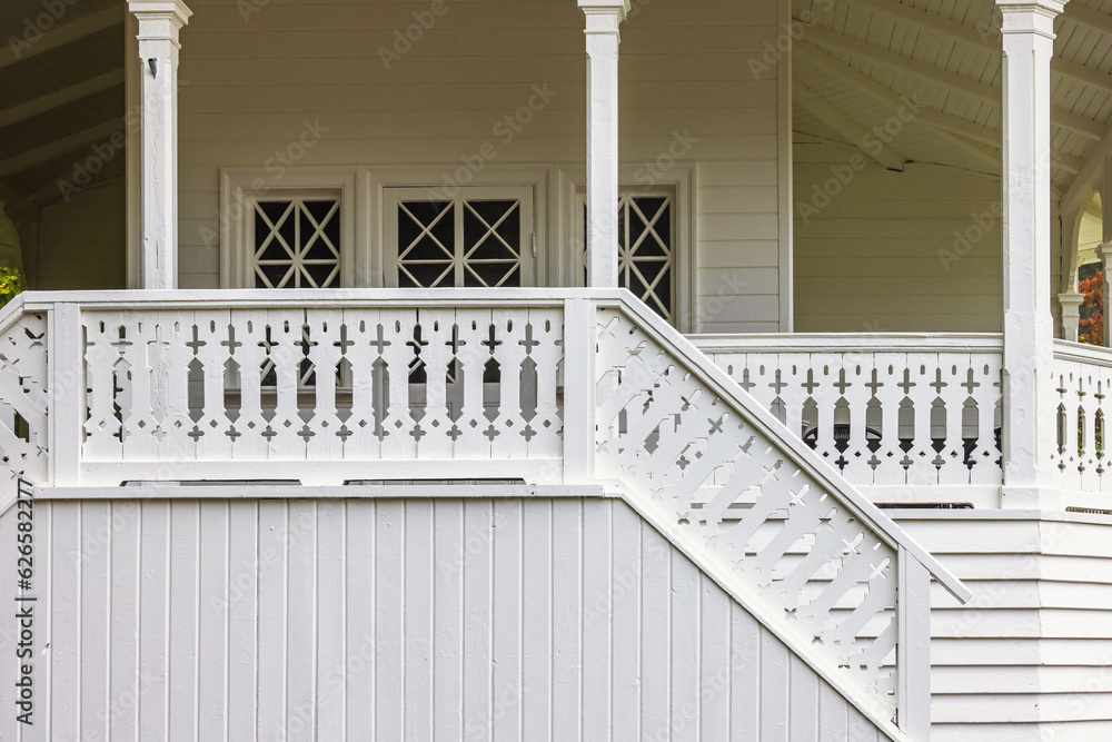 Canvas Prints Idyllic gazebo with woodwork decorations on the railings and the stair