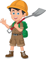 Little boy in a scout costume with a shovel