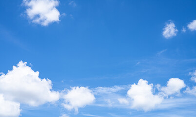 Naklejka na ściany i meble Beautiful blue sky and white cumulus clouds abstract background. Cloudscape background. Blue sky and fluffy white clouds on sunny days. Beautiful blue sky. World Ozone Day. Ozone layer. Summer sky.