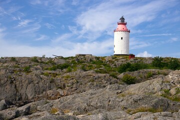 Fototapeta na wymiar Lighthouse in Swedish village Landsort on the island of Oja