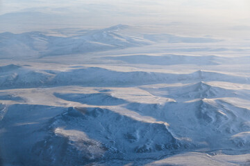 Snow covered mountains range in winter season, Mongolia