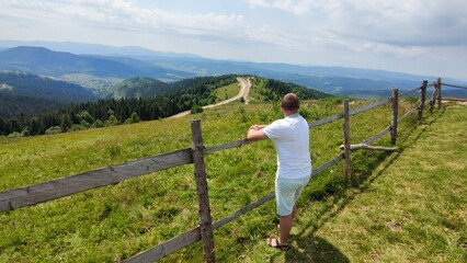 Hiker Traveler Relaxing Meditation Mountain View and Landscape Travel Camping Lifestyle Concept Summer Vacation