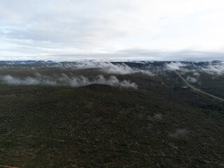 Amazing view of mountains at dawn with morning mist