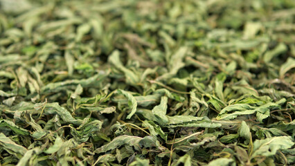 dried mint that is added to soups and gives flavor,