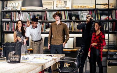Group of diverse and multiracial businesspeople wearing casual clothes for work, meeting and brainstorming about project and marketing plan in modern indoor meeting room at office. Business Concept.