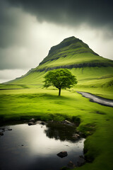 Moody Icelandic Mountain Landscape with Lone Tree Reflecting in Pond under Dark Stormy Sky