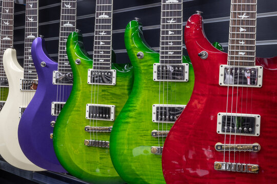 Paul Reed Smith Guitar display. PRS Guitars manufactures a wide array of guitars, bass guitars and amplifiers.