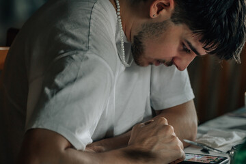 young man with mobile phone or smartphone